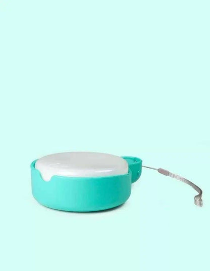 Aquamarine anti-drip travel bottle for dogs with compact design, 250ml capacity.