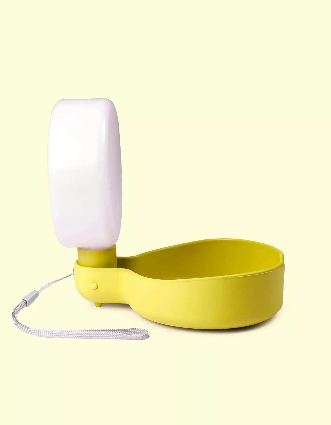 Yellow travel bottle with anti-drip valve for dogs, compact and light, 250ml capacity.