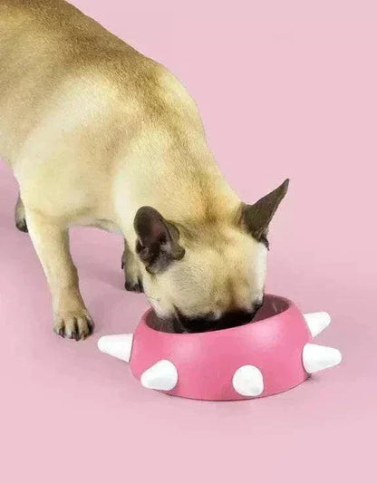 Eco-friendly sloping dog bowl, pink with white studs, ideal for brachycephalic dogs.
