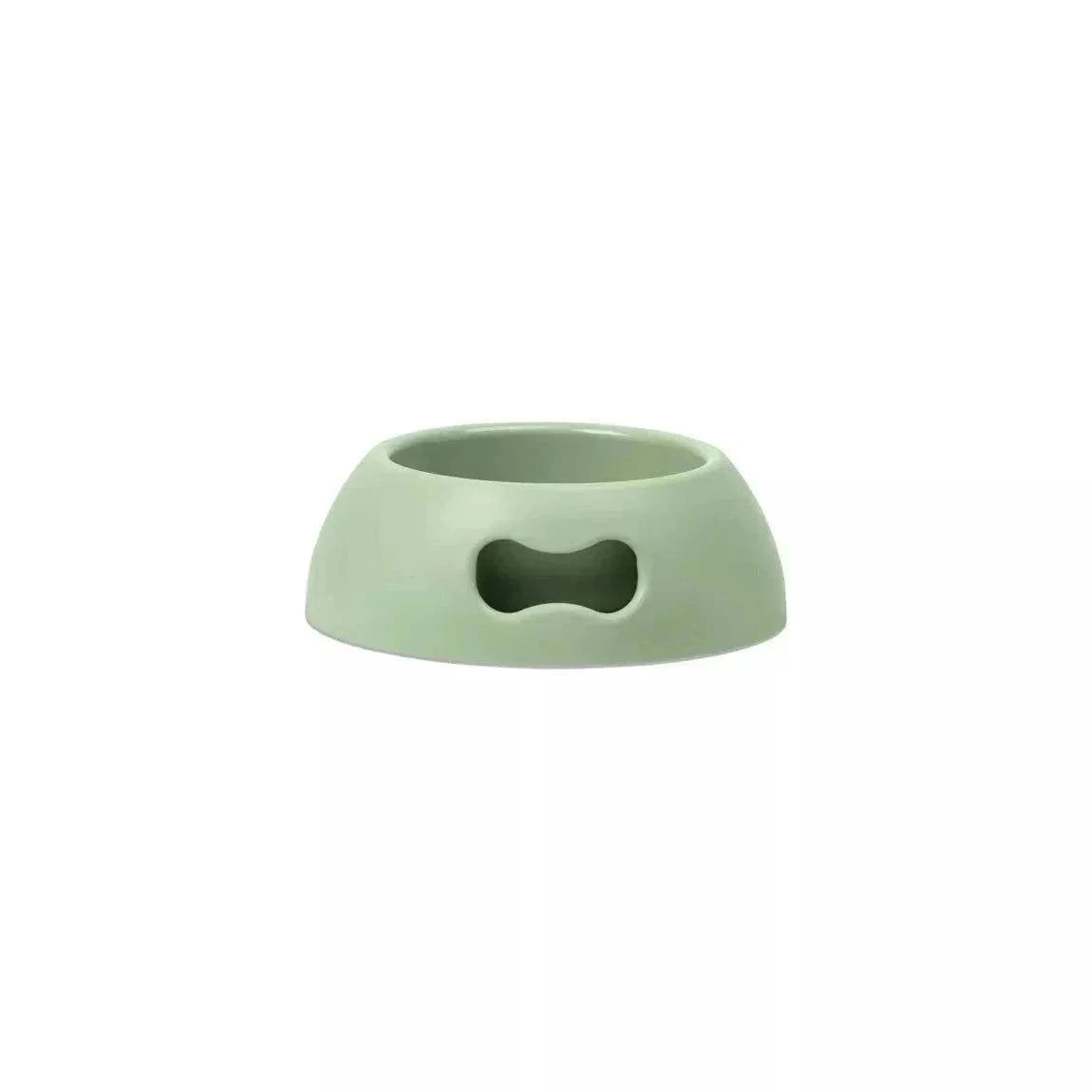 Indestructible eco-friendly bowl for pets in green, non-slip with handle.