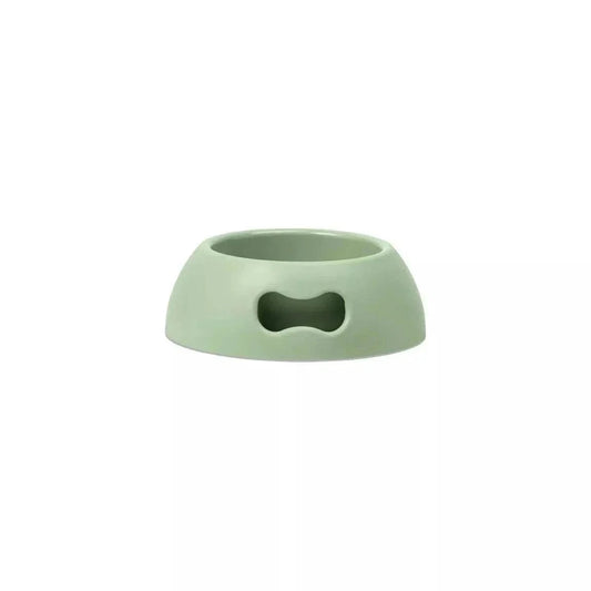 Indestructible eco-friendly bowl for pets in green, non-slip with handle.